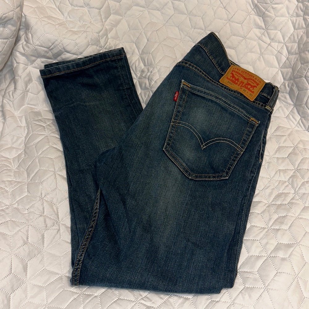 Levi Strauss 502 men’s flex Jeans 32x30 EUC medium wash